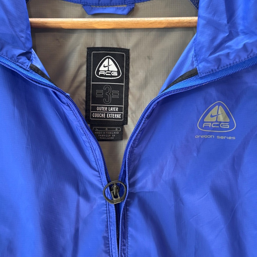 Nike‎ ACG Packable Windbreaker Jacket Womens L Blue Vintage Outdoor Lightweight